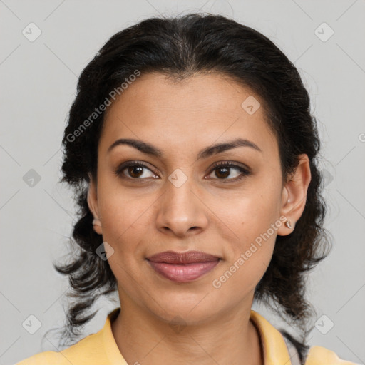 Joyful latino young-adult female with medium  brown hair and brown eyes