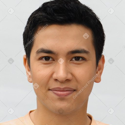 Joyful asian young-adult male with short  brown hair and brown eyes