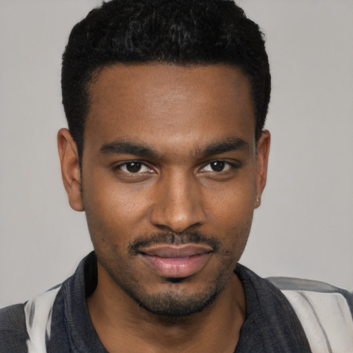 Neutral black young-adult male with short  black hair and brown eyes