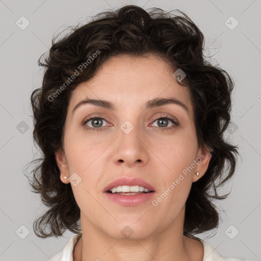 Joyful white young-adult female with medium  brown hair and green eyes