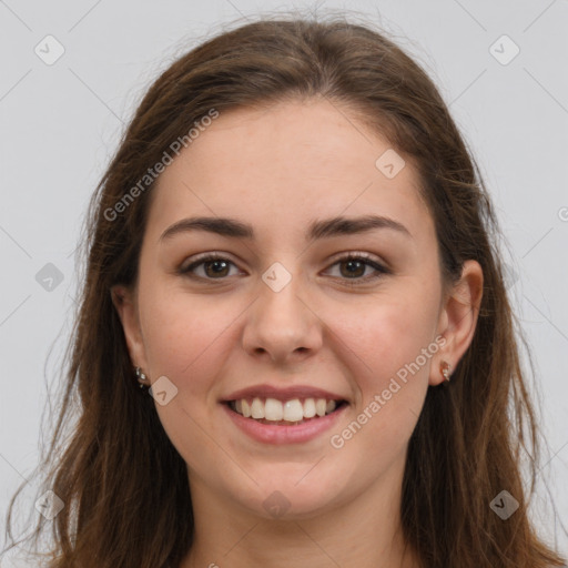 Joyful white young-adult female with long  brown hair and grey eyes