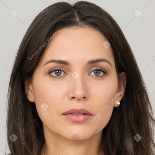 Neutral white young-adult female with long  brown hair and brown eyes