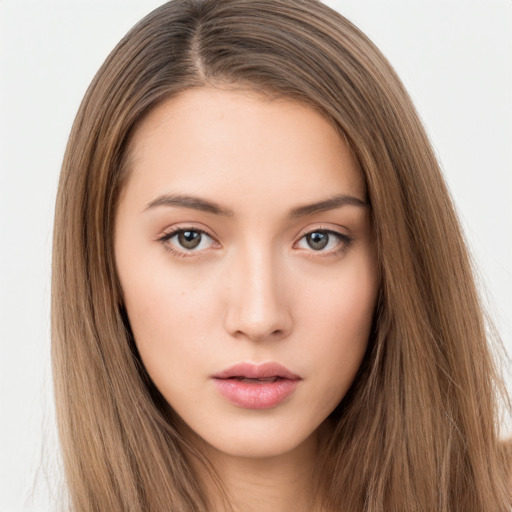 Neutral white young-adult female with long  brown hair and brown eyes