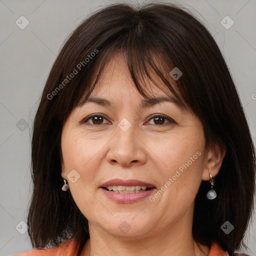 Joyful white adult female with medium  brown hair and brown eyes