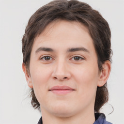 Joyful white young-adult male with medium  brown hair and brown eyes