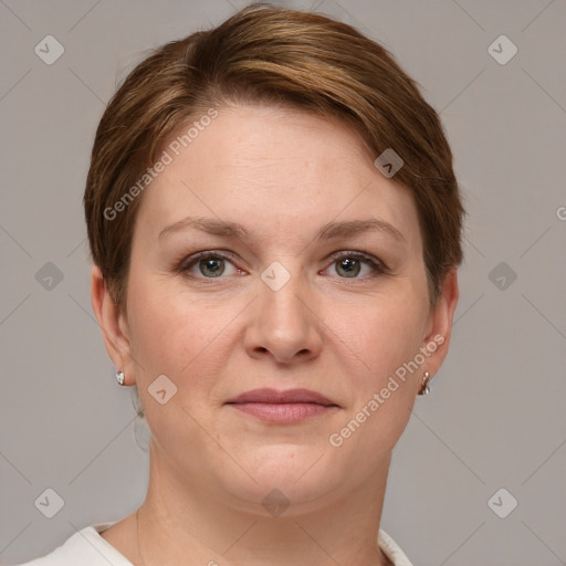 Joyful white young-adult female with short  brown hair and grey eyes