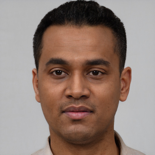 Neutral latino young-adult male with short  black hair and brown eyes