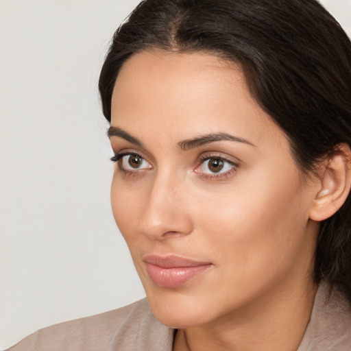 Neutral white young-adult female with medium  brown hair and brown eyes