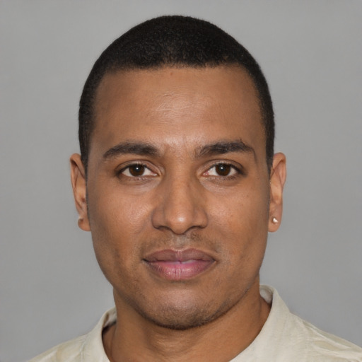 Neutral black young-adult male with short  black hair and brown eyes