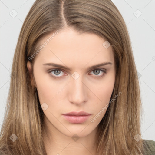 Neutral white young-adult female with long  brown hair and brown eyes