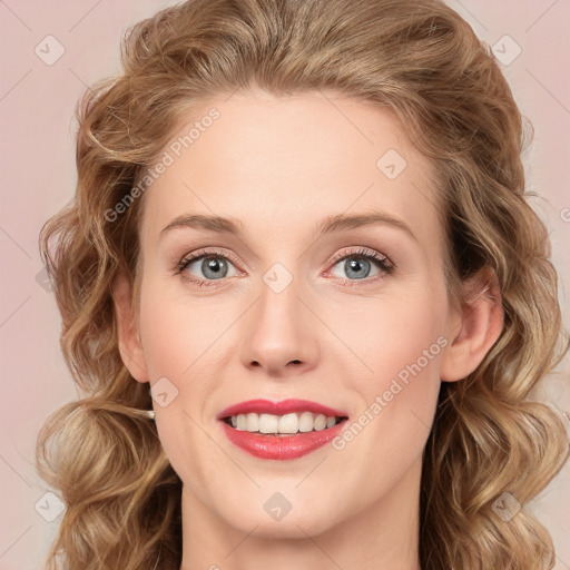 Joyful white young-adult female with medium  brown hair and green eyes