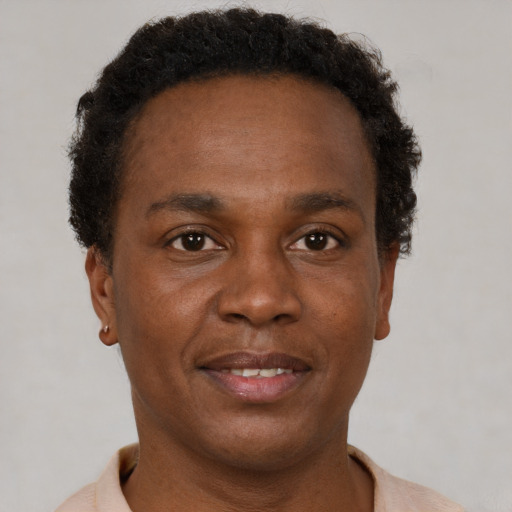 Neutral black young-adult male with short  brown hair and brown eyes