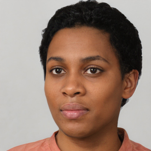 Neutral black young-adult female with short  black hair and brown eyes