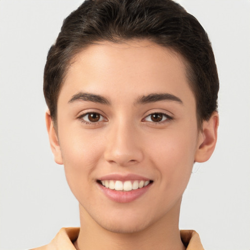 Joyful white young-adult female with short  brown hair and brown eyes