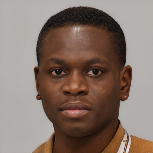 Neutral black young-adult male with short  brown hair and brown eyes
