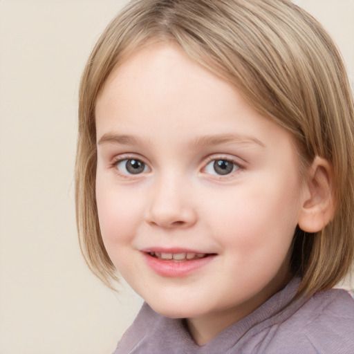 Joyful white child female with medium  brown hair and grey eyes