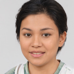 Joyful white young-adult female with medium  brown hair and brown eyes