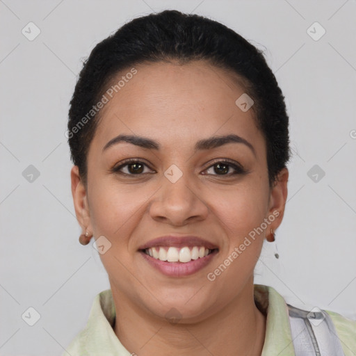 Joyful latino young-adult female with short  brown hair and brown eyes