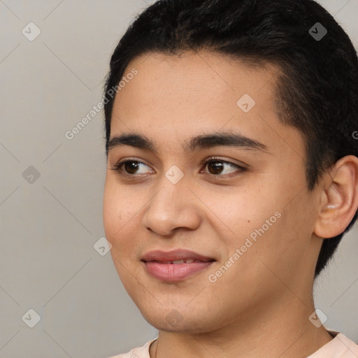 Joyful latino young-adult male with short  black hair and brown eyes