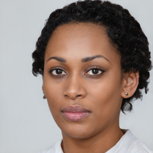 Neutral black young-adult female with short  black hair and brown eyes