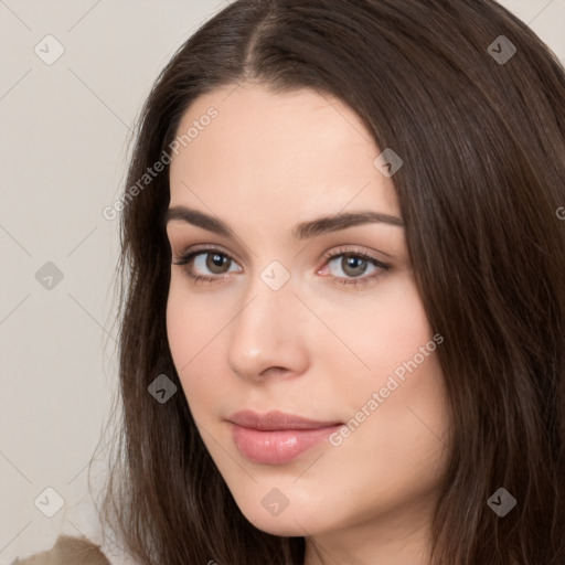 Neutral white young-adult female with long  brown hair and brown eyes