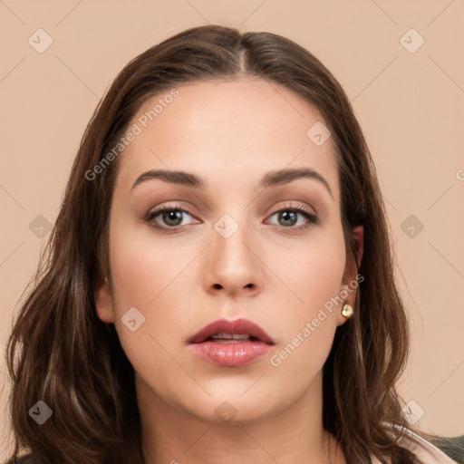 Neutral white young-adult female with long  brown hair and brown eyes