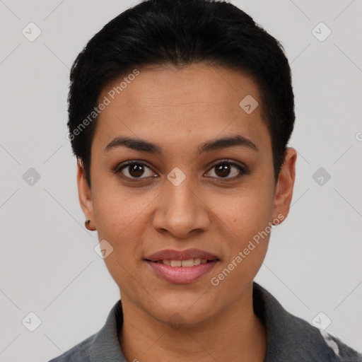 Joyful latino young-adult female with short  black hair and brown eyes