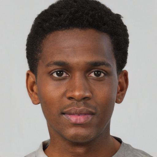 Neutral black young-adult male with short  brown hair and brown eyes