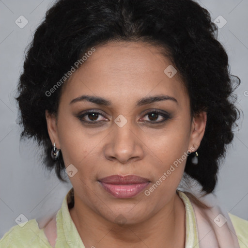 Joyful latino adult female with medium  brown hair and brown eyes