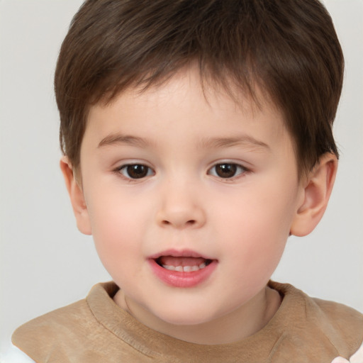 Joyful white child male with short  brown hair and brown eyes