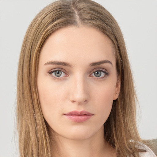 Neutral white young-adult female with long  brown hair and grey eyes