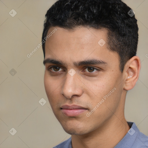 Neutral white young-adult male with short  black hair and brown eyes