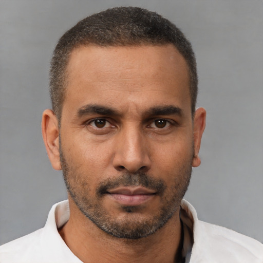 Neutral black young-adult male with short  brown hair and brown eyes