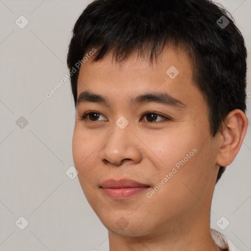 Joyful asian young-adult male with short  brown hair and brown eyes