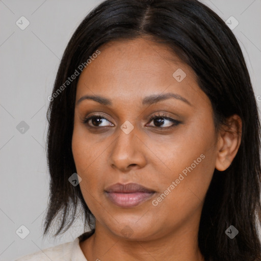 Joyful latino young-adult female with long  brown hair and brown eyes