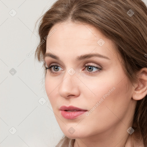 Neutral white young-adult female with long  brown hair and grey eyes