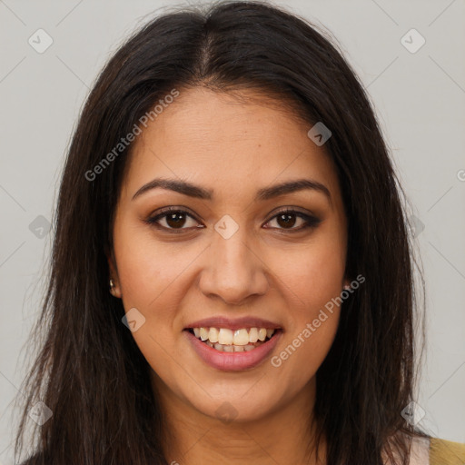 Joyful latino young-adult female with long  brown hair and brown eyes