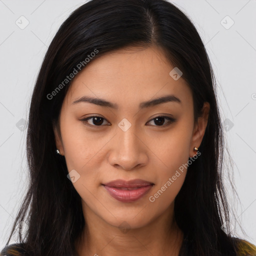 Joyful latino young-adult female with long  brown hair and brown eyes