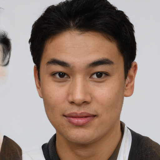 Neutral asian young-adult male with short  brown hair and brown eyes