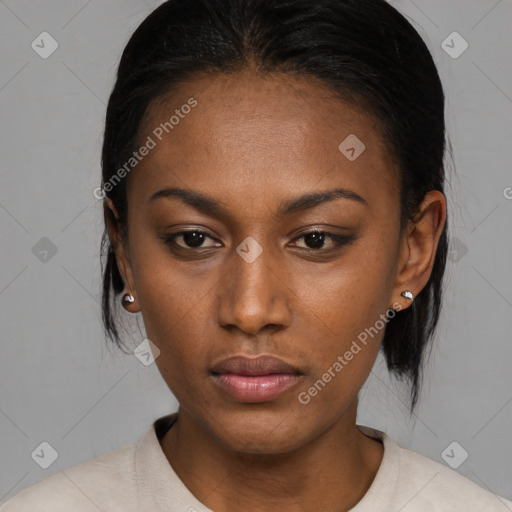 Neutral black young-adult female with medium  brown hair and brown eyes