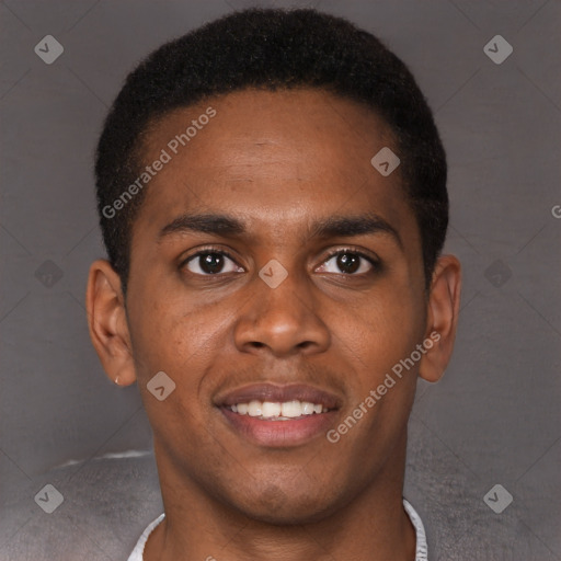 Joyful black young-adult male with short  brown hair and brown eyes