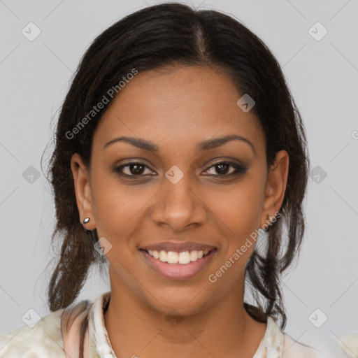 Joyful black young-adult female with medium  brown hair and brown eyes