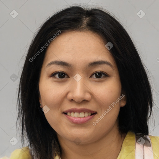 Joyful asian young-adult female with medium  brown hair and brown eyes