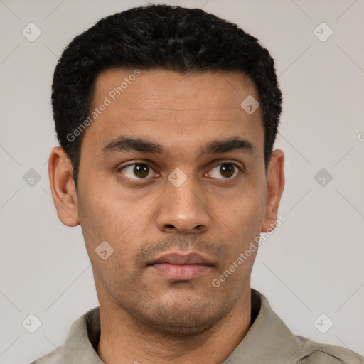 Neutral latino young-adult male with short  black hair and brown eyes