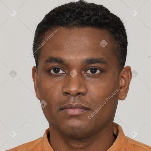 Neutral black young-adult male with short  black hair and brown eyes