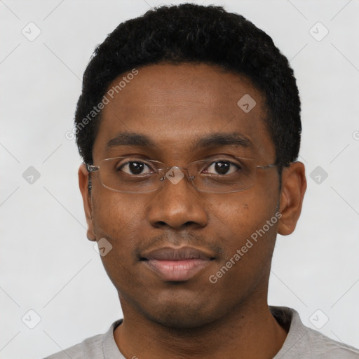 Neutral black young-adult male with short  black hair and brown eyes