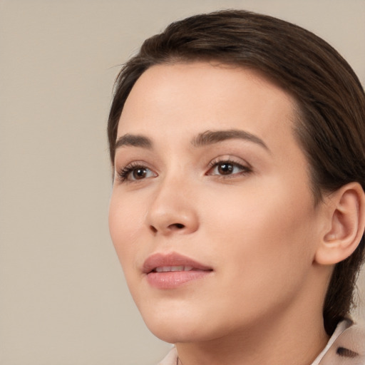 Neutral white young-adult female with medium  brown hair and brown eyes