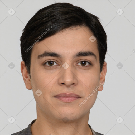 Joyful white young-adult male with short  brown hair and brown eyes