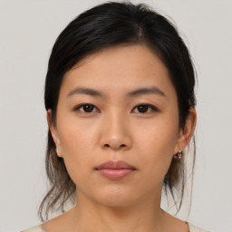 Neutral asian young-adult female with medium  brown hair and brown eyes