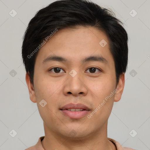 Joyful asian young-adult male with short  brown hair and brown eyes